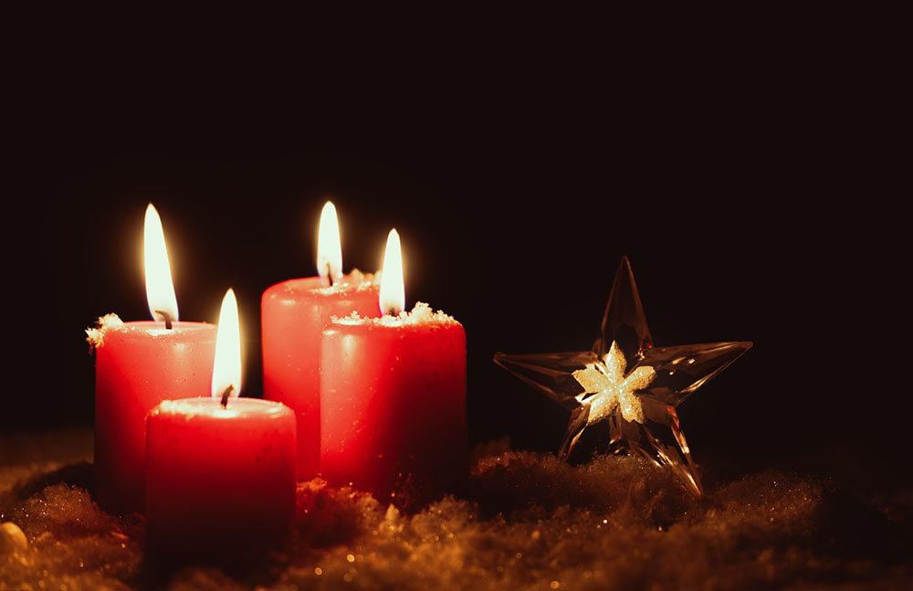 свещи за коледна декорация - символика